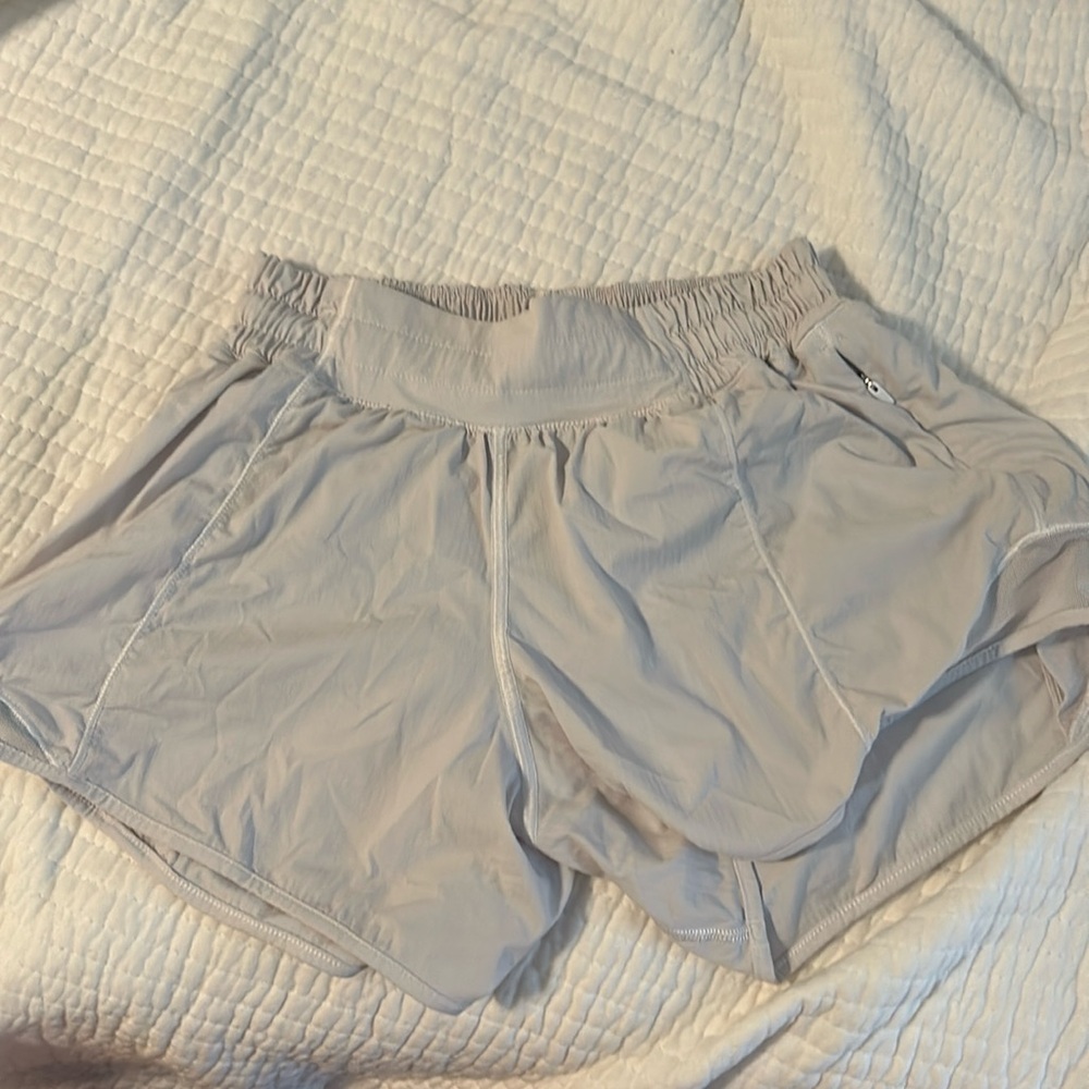 White lululemon low rise hotty hot shorts